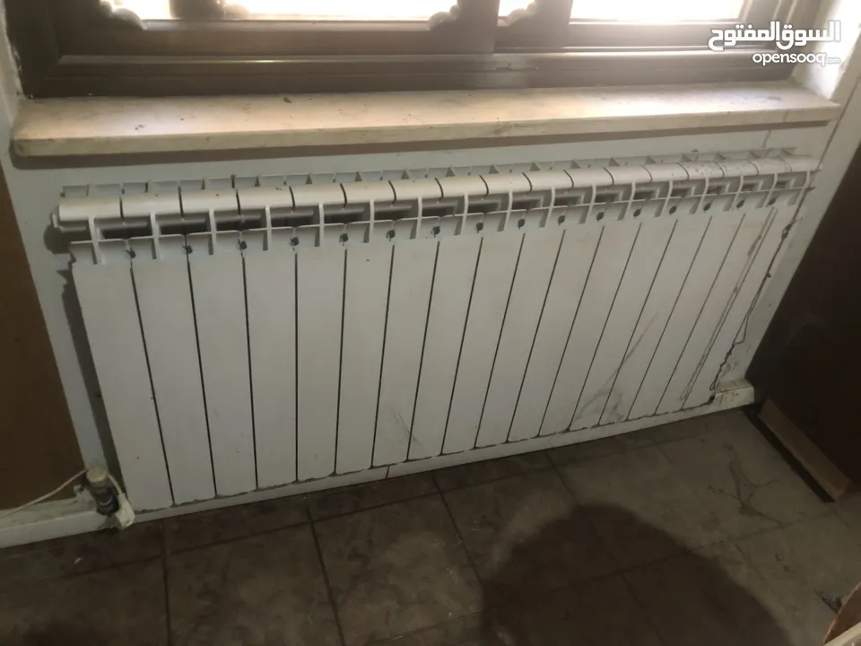 ماطور تدفئة مركزية مع خزان سولار مع الراديترات (المشعاعات)