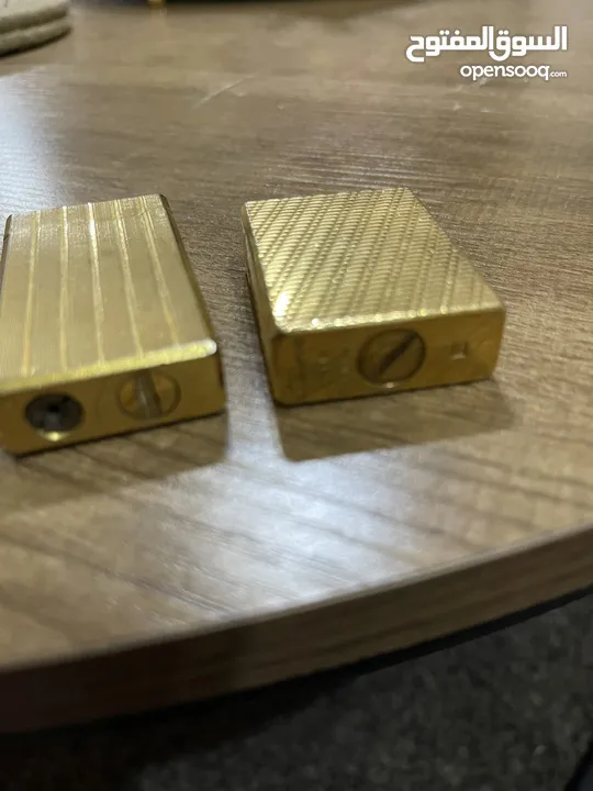 ولاعتين ديبونت ( s t Dupont )صناعه فرنسيه مطلي بالذهب