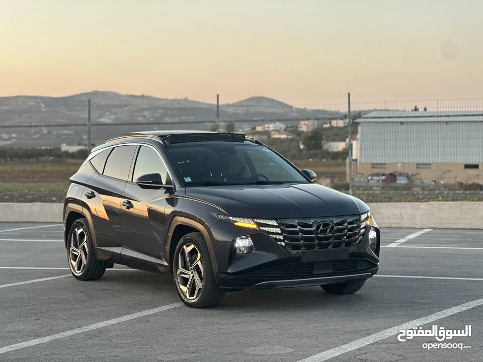 هونداي توسان/2022 Plug In فل الفل فتحة سقف بانوراما  4x4 ///271Hp   ( Haybrid) 1600cc
