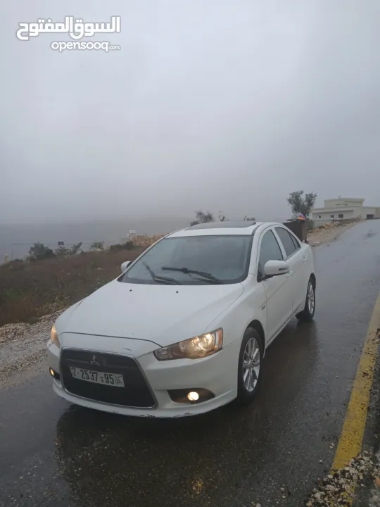 ميتسوبيشي لانسر. 2015 اصل برايفت رخصة وتامين ماطور 1600 اتومات شامل فتحة