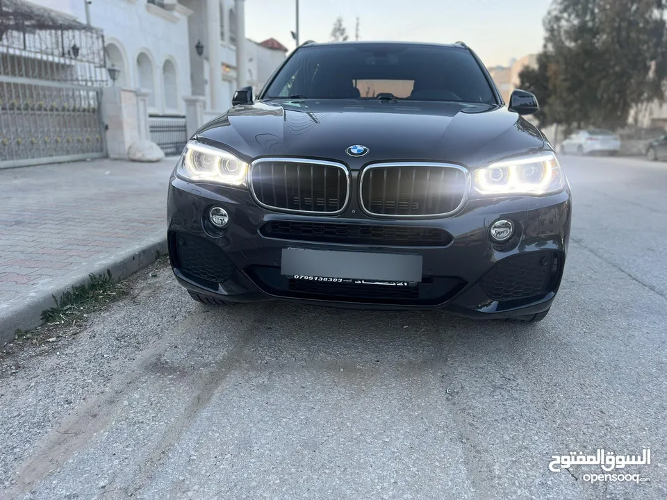 بي ام دبليو X5 بلج ان وارد وكاله عمان  فل كامل فحص كامل بحاله الوكاله دهان الشركه