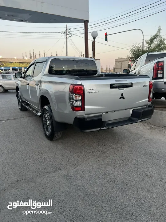 ميتسوبيشي L200 223 زيرو مرتجع ماشي 15 فقط بلاك ايدشن فحص كامل وله ملاحضه