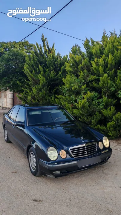 E200. 2002  قرش ونص 2002  رقم الهاتف بالوصف