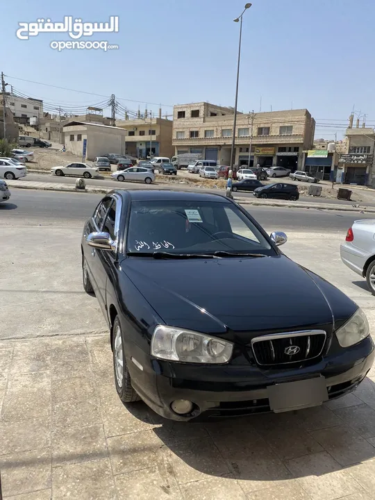 هيونداي افانتي xD لون اسود مميز ميتالك  موديل 2000
