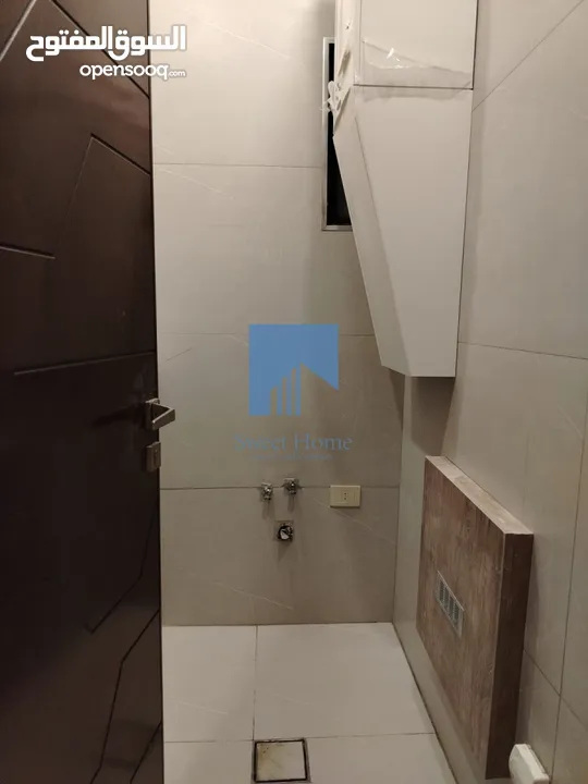 شقة أرضية فاخرة للبيع في خلدا - قرب إشارة الدر المنثور 140م مع حديقة وترسات 70م لم تسكن