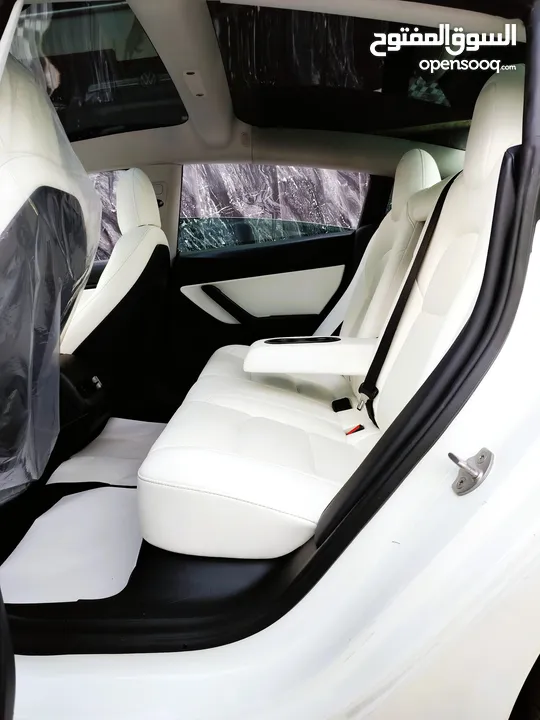 تيسلا 2021 model 3 فحص كامل 4 جـيـد فرش ابيض جنط 19بحالة الوكالة لون مميز للبيع بسعر لقطة ومحروووق
