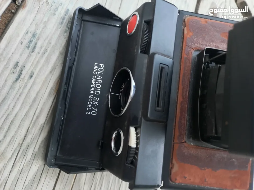 polarid sx70 & OLYMPUS & KODAK DISC