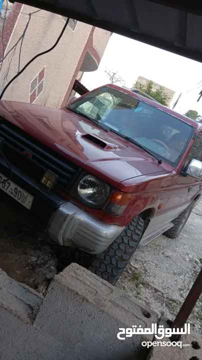 ميتسوبيشي باجيو1999  جير اتوماتيك 7 ركاب غرفه جلد عسليه  جير ومطور جاد مركبات