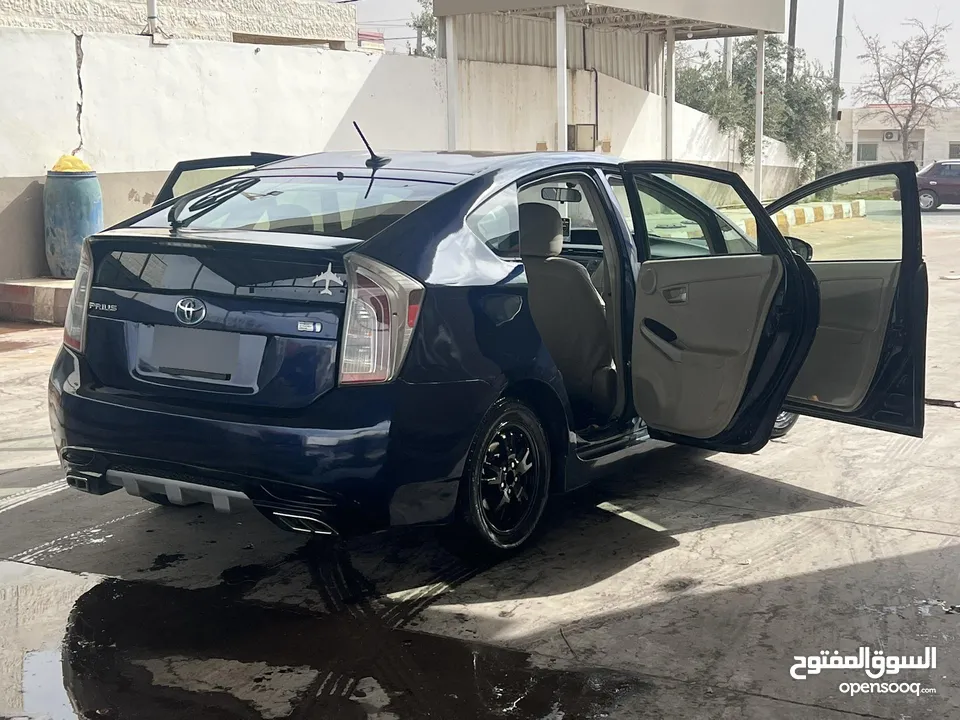 بريوس 2013 بطارية مركزية عمرها 3 سنين فحص البطارية ممتاز 2 جيد امامي