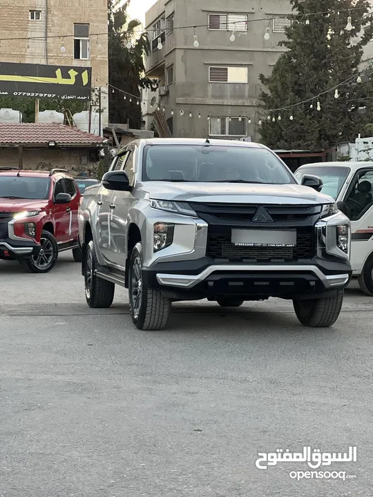 ميتسوبيشي L200 223 زيرو مرتجع ماشي 15 فقط بلاك ايدشن فحص كامل وله ملاحضه