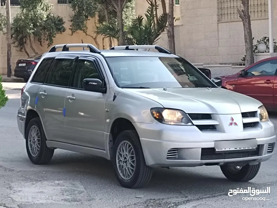 ميتسوبيشي آوتلاندر اوتوماتيك 2003 توب نظافة بسعرررر مميززز محرك 2400cc