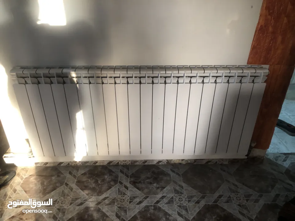 ماطور تدفئة مركزية مع خزان سولار مع الراديترات (المشعاعات)