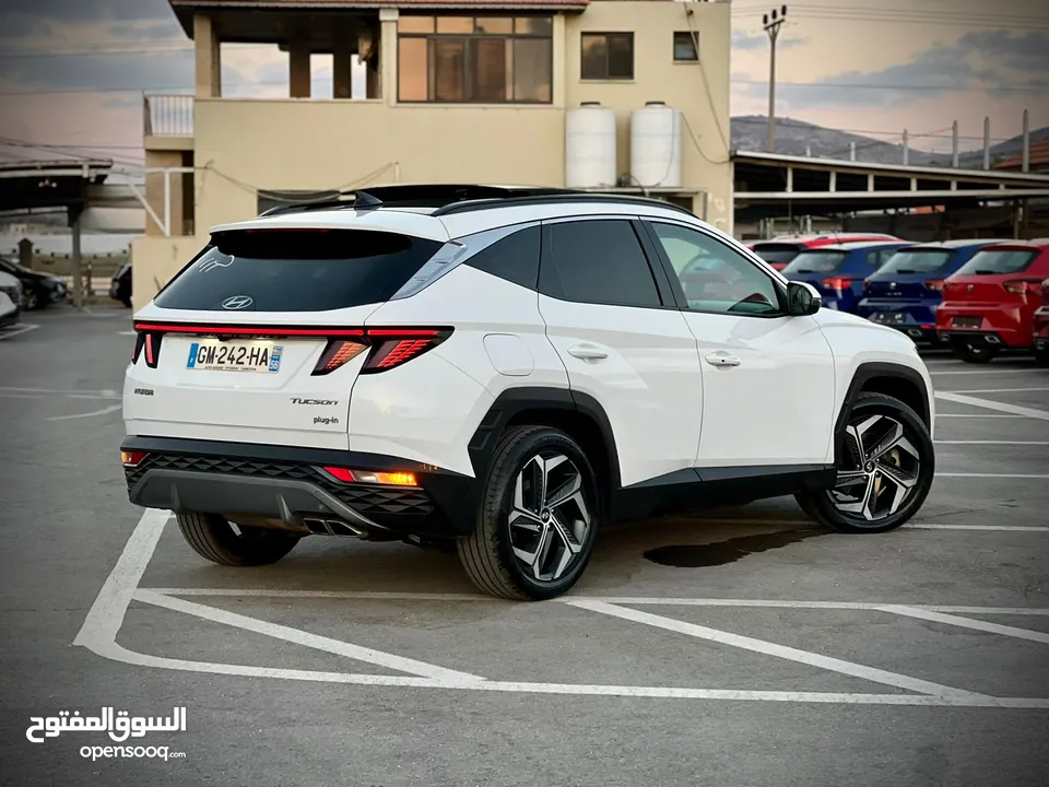 هونداي توسان/2022 Plug In فل الفل فتحة سقف بانوراما  4x4 ///271Hp   ( Haybrid) 1600cc