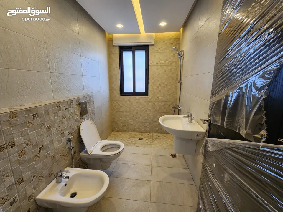 فيلا متلاصقة للبيع في عبدون - ref : 14510