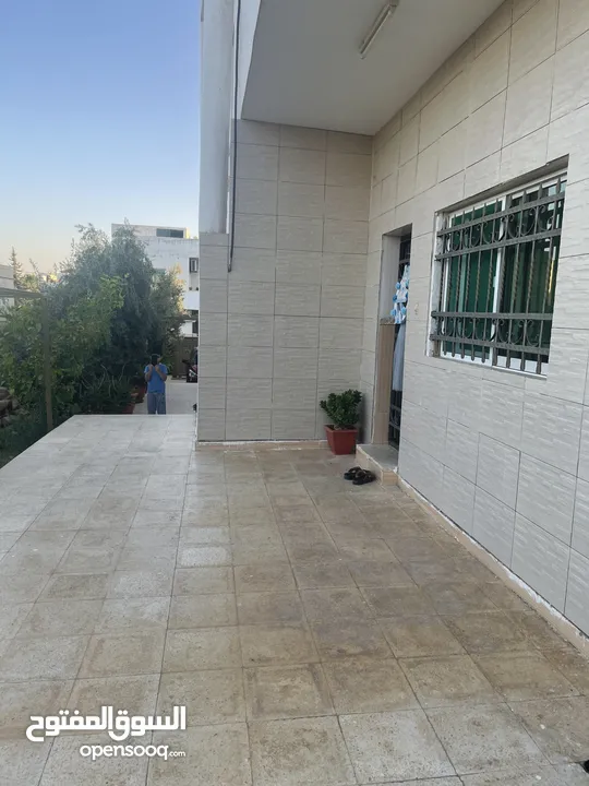 ارض دونم مع بيت ارضي وبيت طابقين