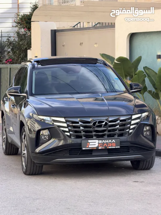 هونداي توسان 2022 هايبرد plug in 4*4 فل اضافات مع بانوراما 271 حصان