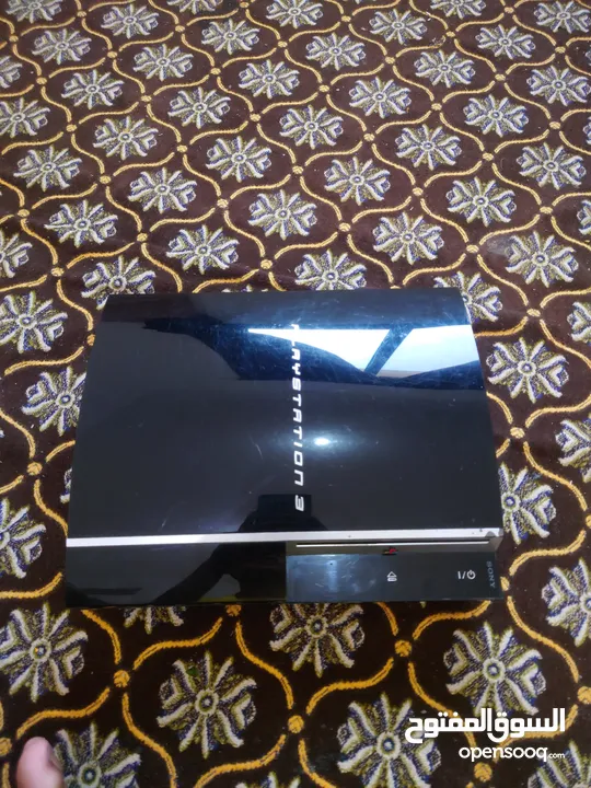 sony PS3 with 2 controller and 21 games