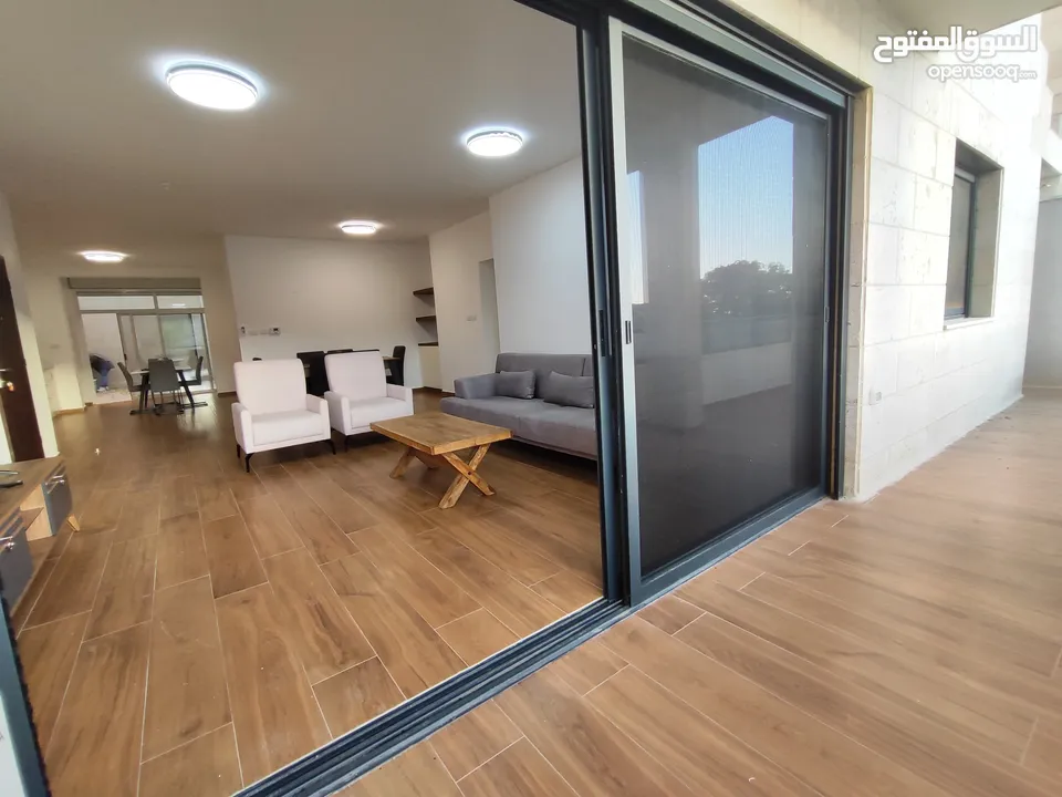 شقة مع حديققققة فخمه جديده مفروشة للإيجار في عين منجد