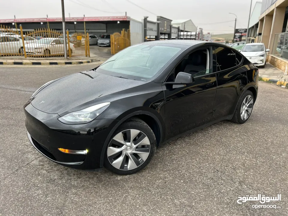 TESLA MODEL Y 2022 LONG-RANGE DUAL MOTOR-7 Seats  (سبع مقاعد)