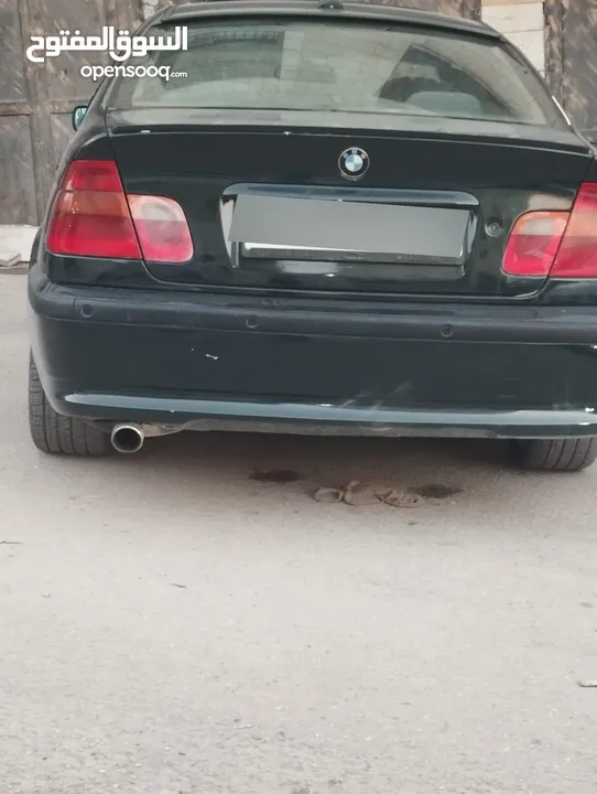 للبيع Bmw e46 2004  لون اخضر زيتي بجننن مع فتحة  دهان جديد السيارة كرتونة