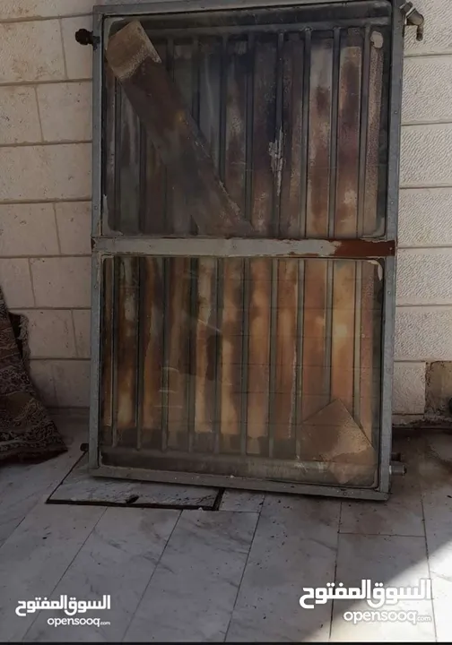 والشبابيك والابواب والحمايه والمواسير والنحاس والالمنيوم تنزيل تنكات . عن الاسطحه وقصها تنظيف اسطح ت