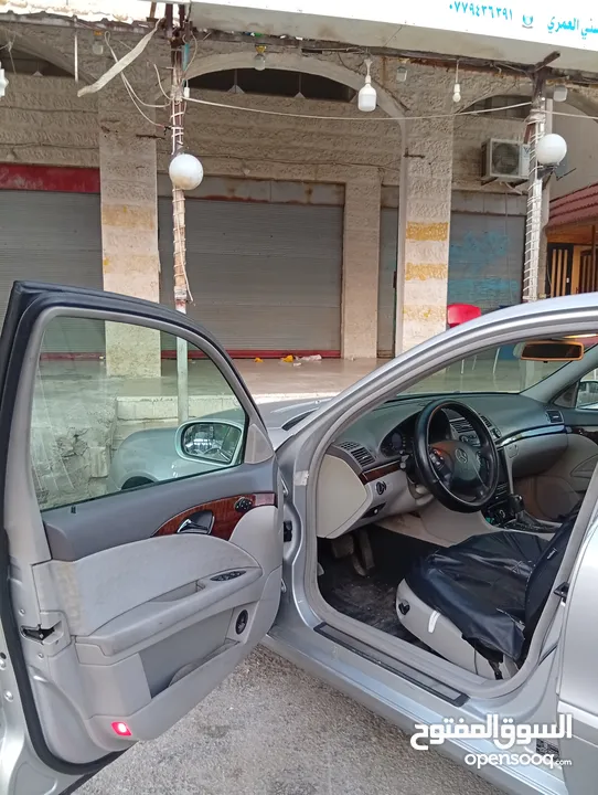 مرسيدس للبدل على احدث e200 كرت ابيض 2004