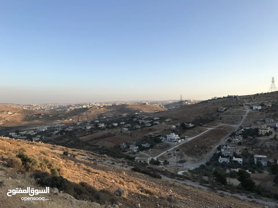 قطعة ارض في أم رمانة قرب شارع الأردن للبيع