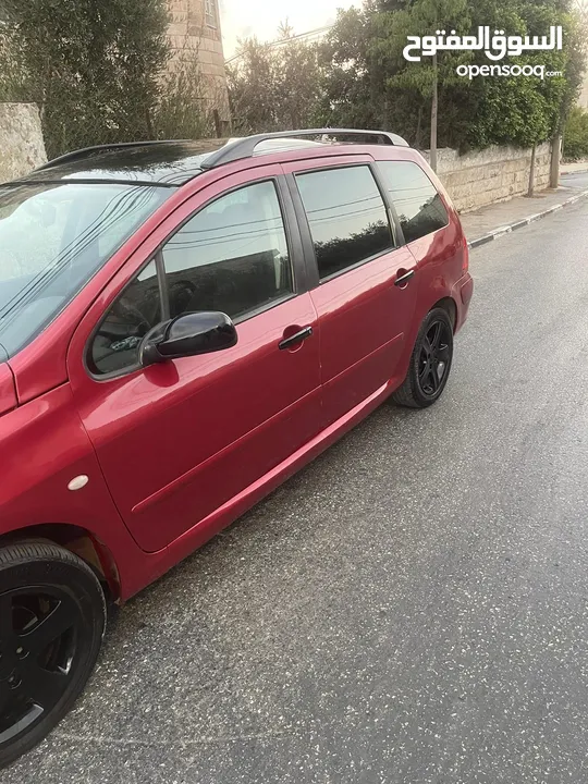 بيجو 307 2005  مطور2000 100% مكنيكيات الف الف دهان جديد مزجان حامي بارد منفوضة من النمرة ل النمرة