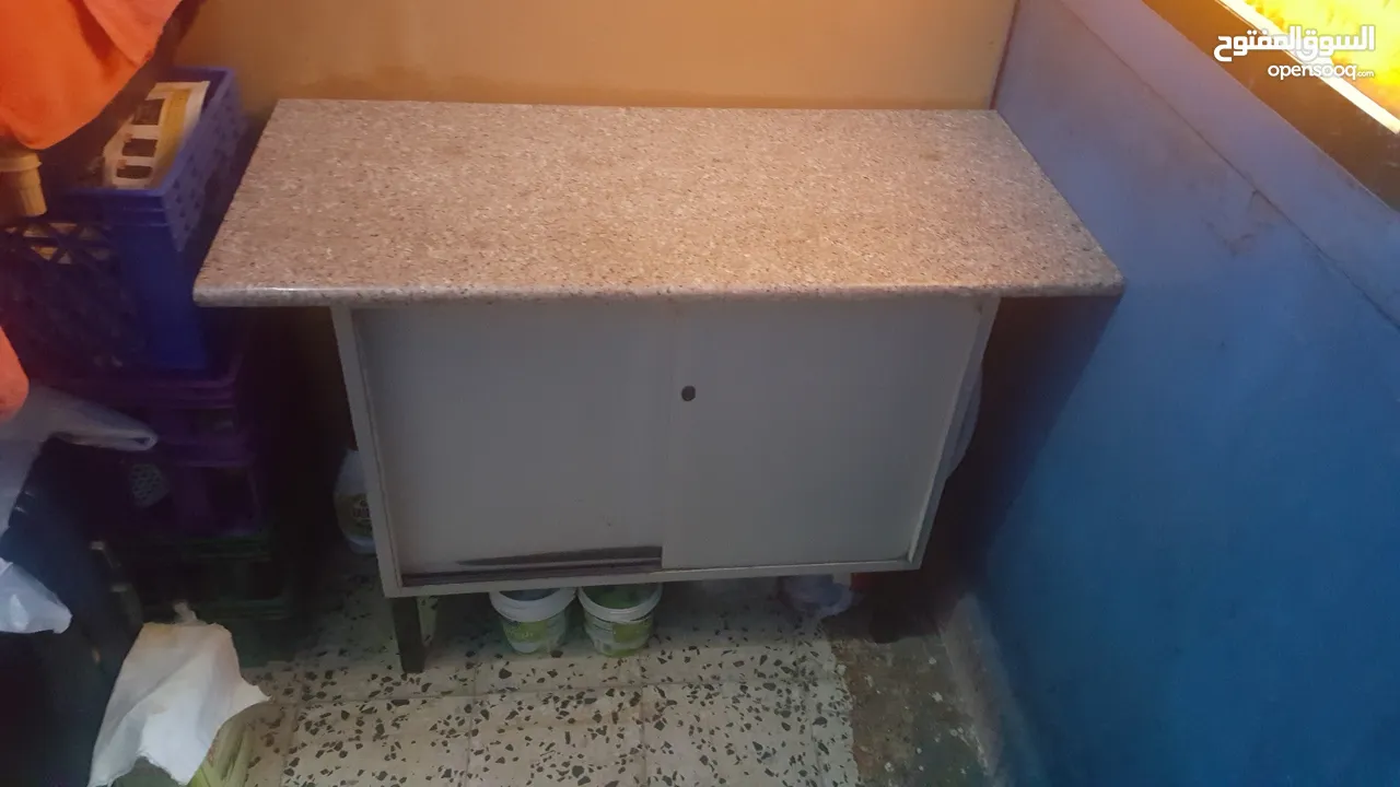 Metal cabinet with granite top going very cheap