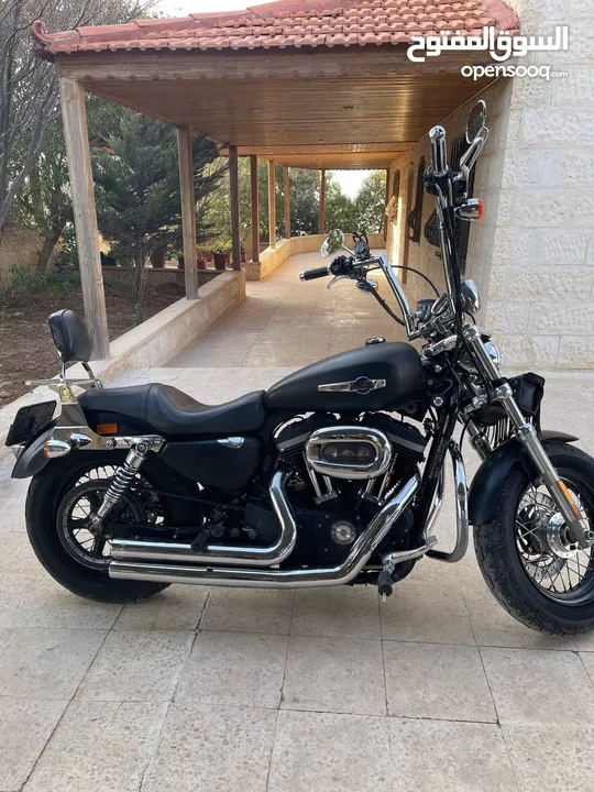 Harley Davidson Sportster XL1200 custom  2013 65000 KM  ترخيص لغاية 5/2025 شغالة 100٪  صيانة دورية