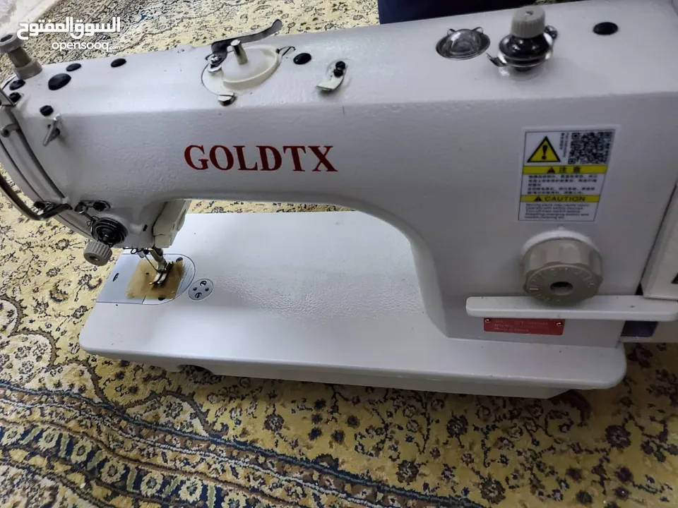 ماكينة خياطة Goldtex (jaki) لساتها بكرتنوتنها جديدة لسا مش مشبكة عليها لوحة