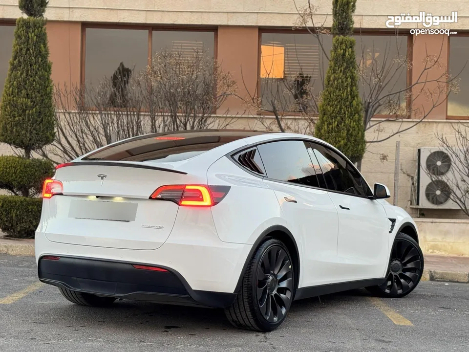 تيسلا موديل y 2022 فل كامل اعلا فئه بيرفورمنس  فحص كامل جمرك جديد  Tesla model Y 2022 performance