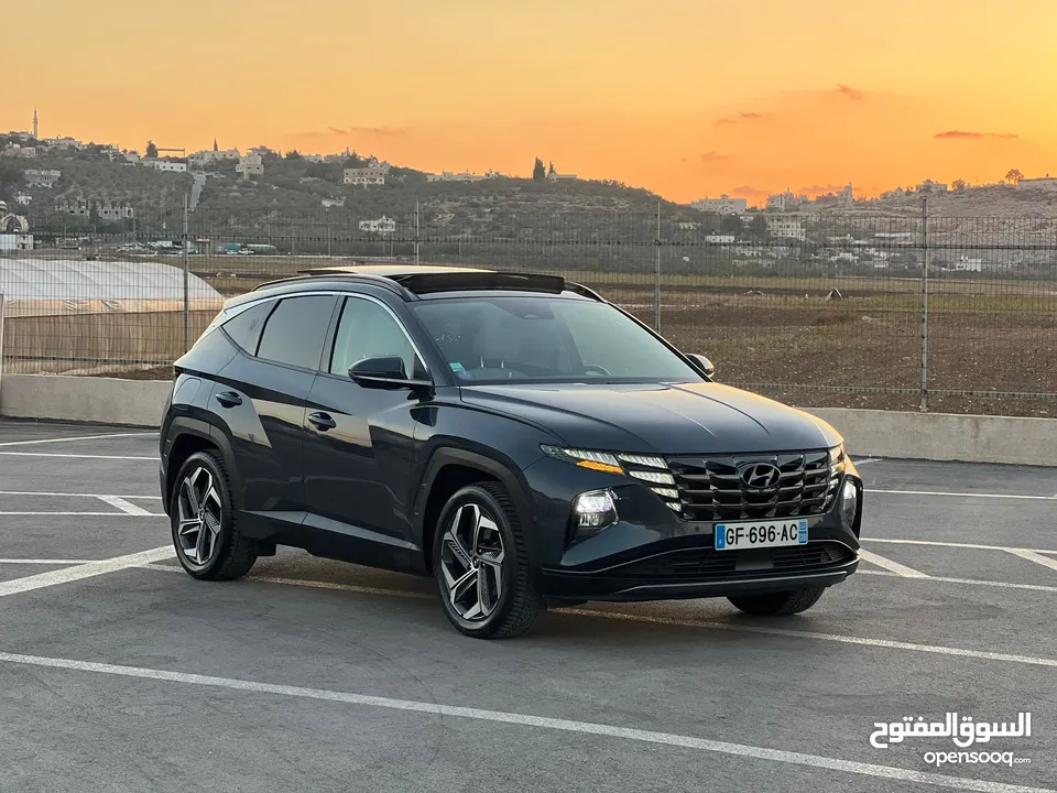 هونداي توسان/2022 Plug In فل الفل فتحة سقف بانوراما  4x4 ///271Hp   ( Haybrid) 1600cc