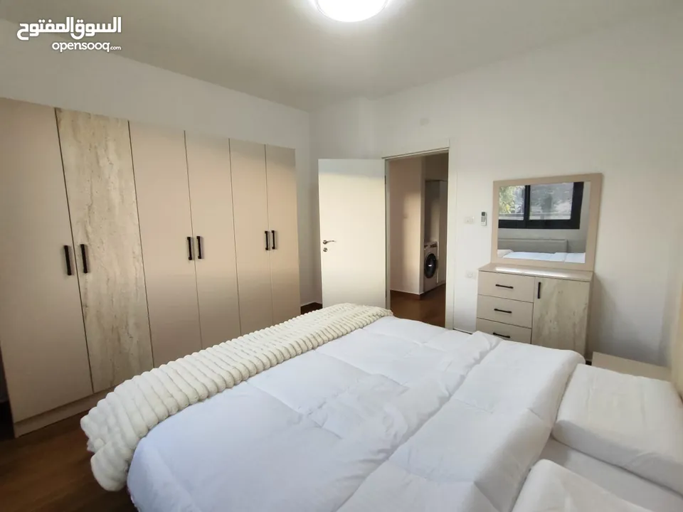 شقة جديدة مفروشة مع حديقة خاصة للإيجار – عين منجد  شارع إسكان المهندسين