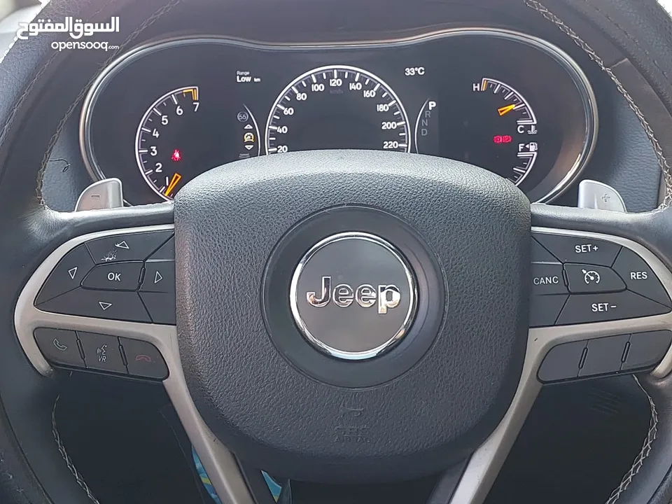 جيب جراند شيروكي فل الفل اعلى فئة بانوراما 2014 فحص كامل لون فيراني مميز بسعر مغري قابل للبدل والاقص