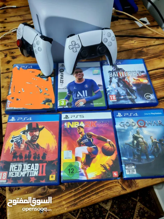 Ps5 slim cd مع ايدي عدد2 و 6 العاب