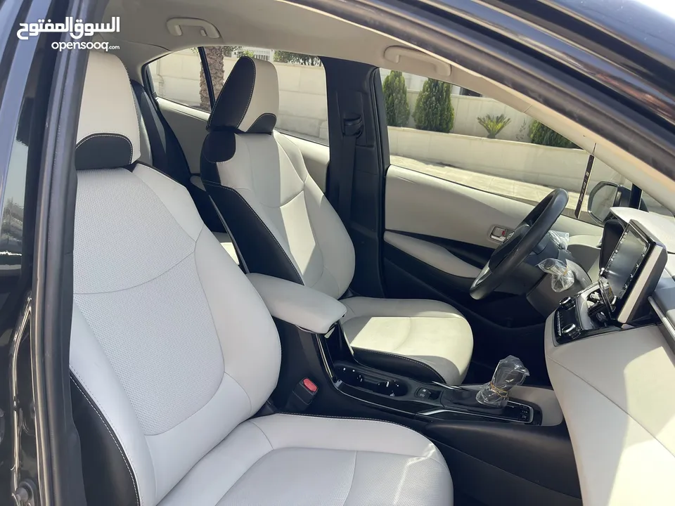 تويوتا كورولا 2020 هايبرد لون اسود حره باسم المستورد