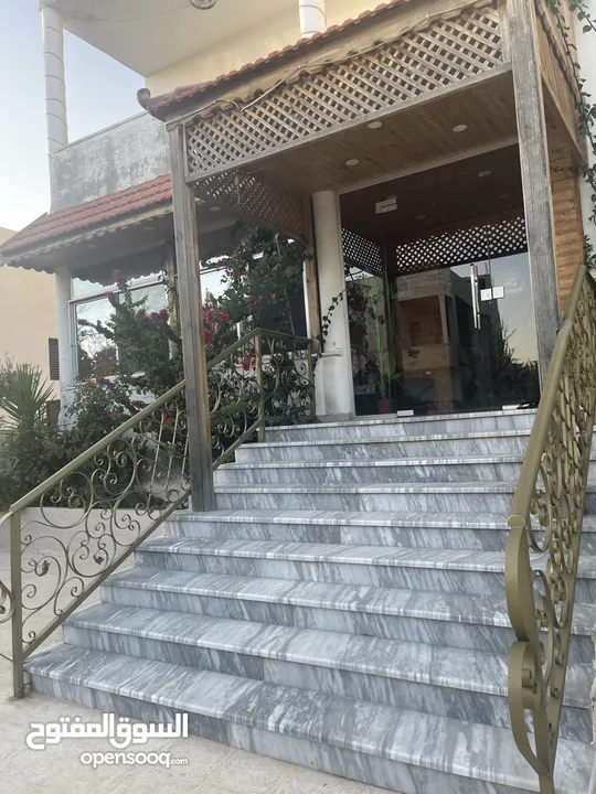 ارض دونم مع بيت ارضي وبيت طابقين