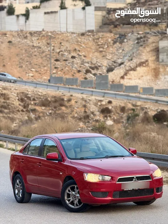 لانسر 2010.اصل خصوصي.بحاله ممتازه .فحص نضيف .اتماتيك .بنزين .رام لله او الخليل