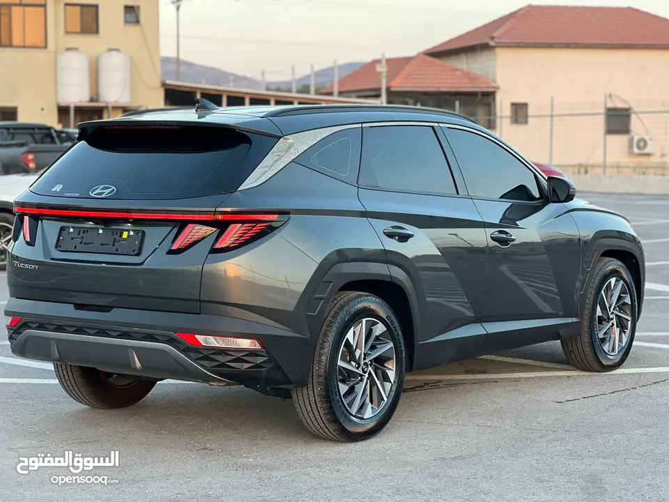 هونداي توسان/2022 فل الفل بدون فتحة سقف  2x4 ///240Hp بنزين + كهرباء  ( Haybrid) 1600cc