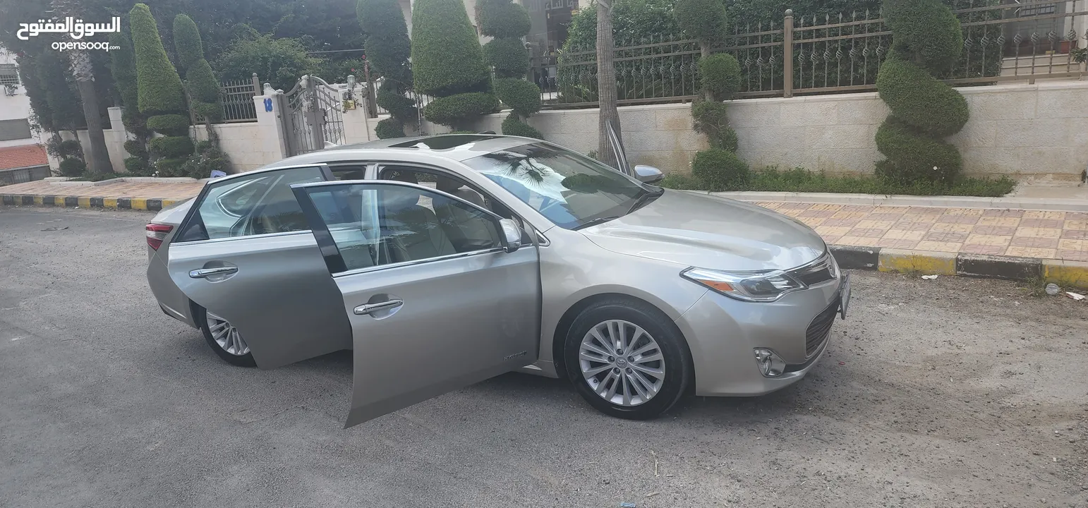 تويوتا افالون هايبرد 2015 فل كامل وأعلى صنف Limited وارد و مواصفات أمريكيه مالك واحد فحص كامل