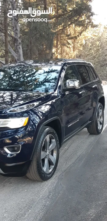جيب جراند شيروكي 2016 ليمتد فحص كامل بانوراما  لون مميز جدآ واضح ممشى قليل  Jeep  4x4