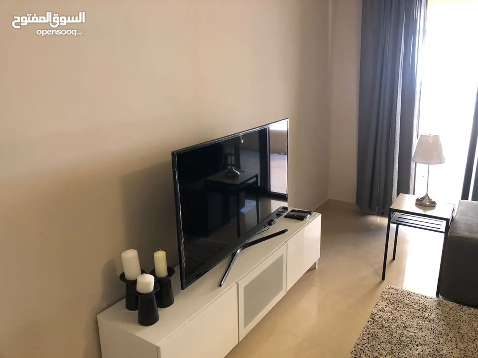 شقة ارضية مفروشة للايجار غرفتين نوم مع حديقة في عبدون