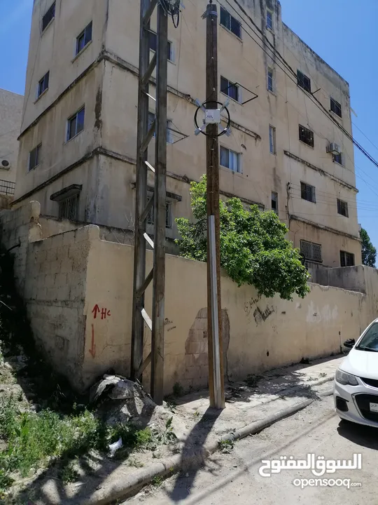 عماره مع ارض للبيع تصلح للاستثمار او اسكان