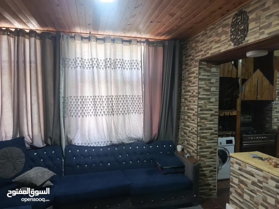شقه ارضيه للبيع كاش او اقساط عن طريق البنك العربي الإسلامي الدولي في عمان حي نزال على الشارع الرئيسي
