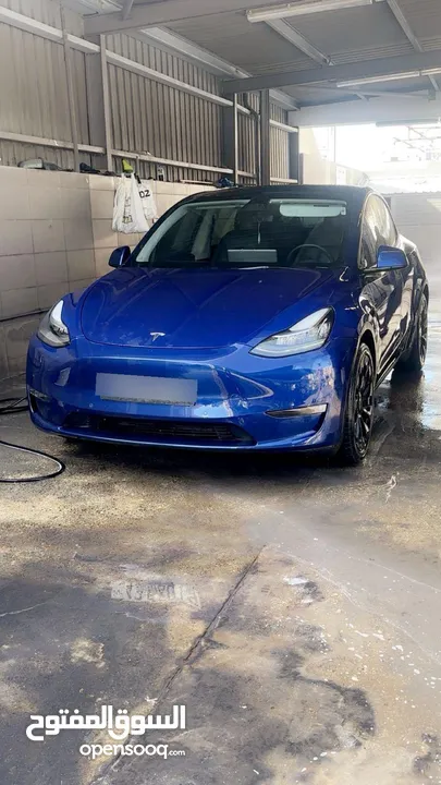 تيسلا مودل Y Long range- Dual Motors 2021 فحص كامل B+ بحالة الوكالة 7 مقاعد لون كحلي جنوط بيرفورمنس