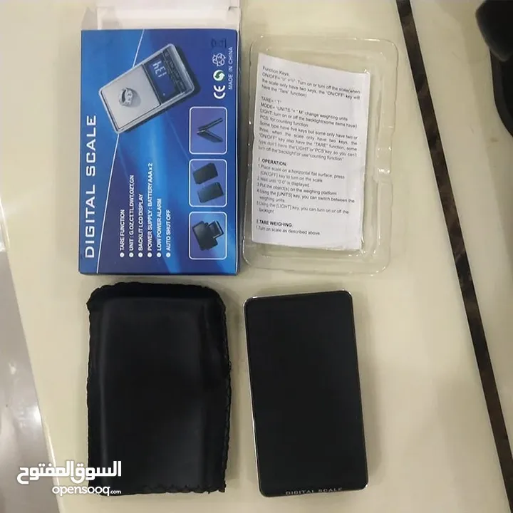 ميزان الذهب الدقيق مع محفظه جلد وكفر حماية  الأدق في الأسواق. اصغر ميزان بالعالم .