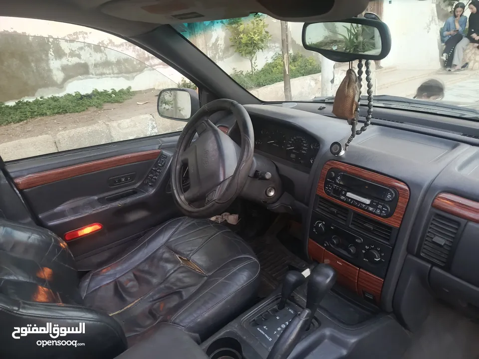 مواصفات جيب شروكي 1999
