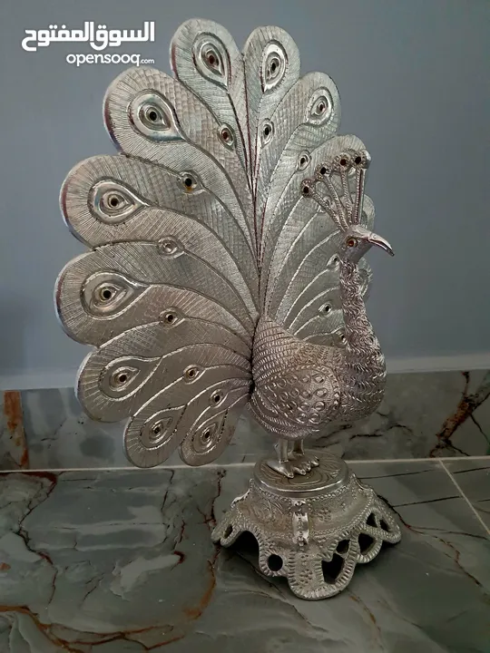 Chemmanur jewellers antique silver decorative items (camel,birds,peacock etc)