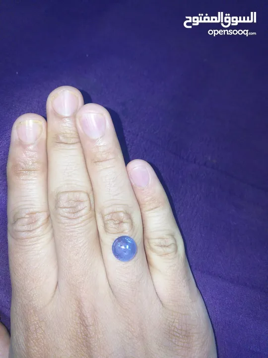 حجر تنزانايت طبيعي مع إثبات فحص المختبر  natural tanzanite stone with lab test